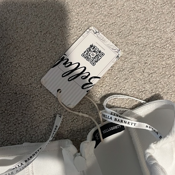 Never worn new with tags. Amazing quality, no blemishes very flattering. - Picture 3 of 3